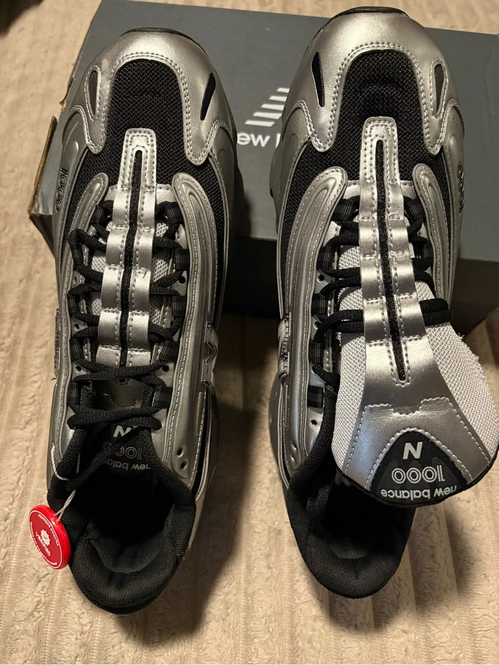 New Balance metallic silver